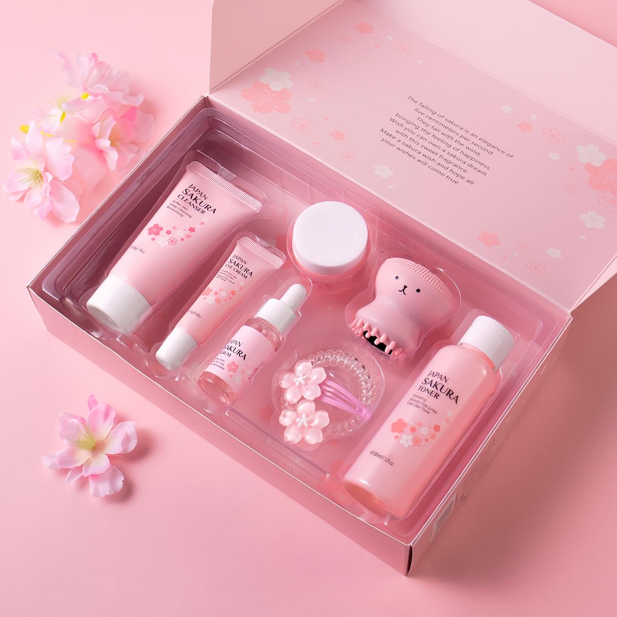 8 Pcs SakuraSkincare Set Complete Facial Care with Vitamin C, Includes Cleanser, TonerSerum, Eye Cream, Essence Cream, Sakura hairpin, Sakura hair rope, Pink octopus face wash massager